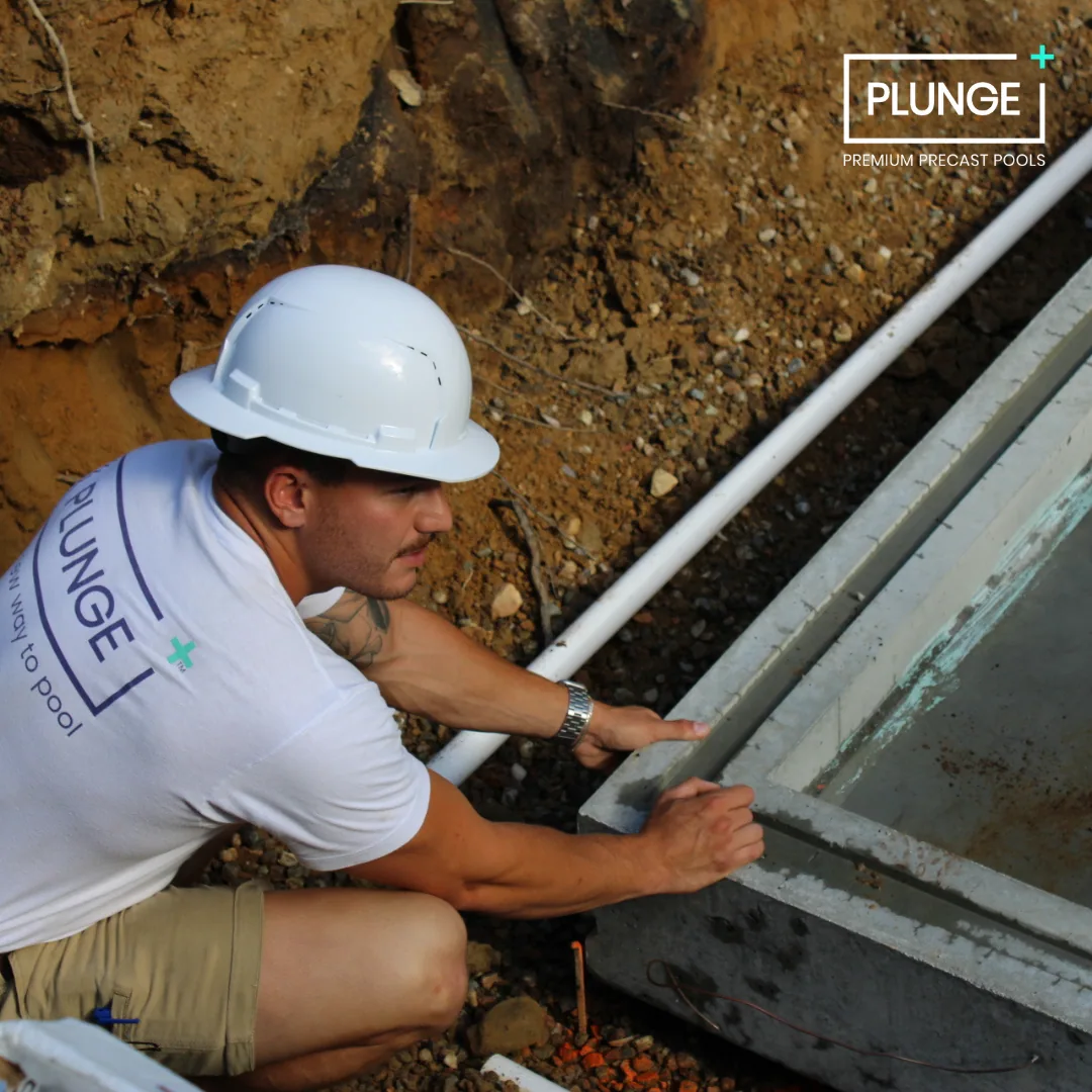 Pool technician performing a plunge pool install service in West Little Rock, Arkansas